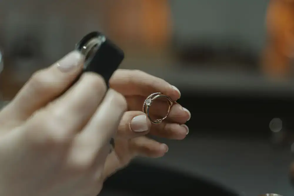 Close-up perspective of a jeweller examining a custom ring setting