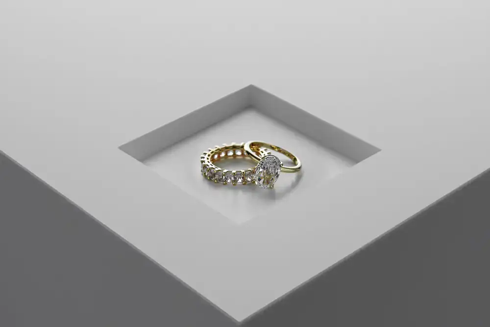 Bold, sculptural silver and gold rings stacked together