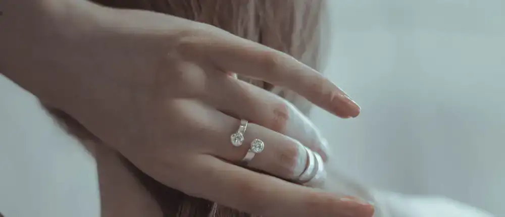 Close-up of a silver ring being polished in the studio